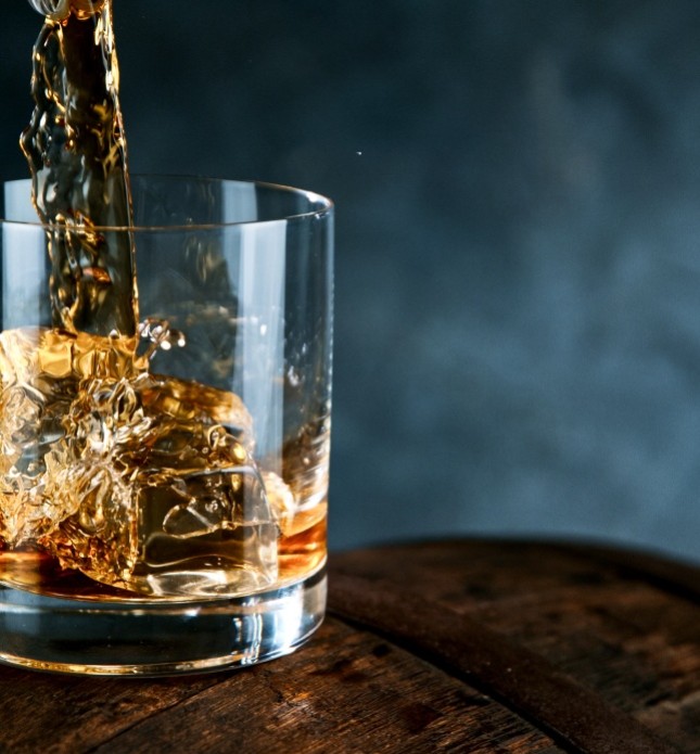 Whisky pouring in glass